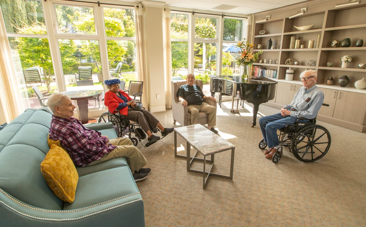 Residents having a conversation at Sagebrook Senior Living at San Francisco. 