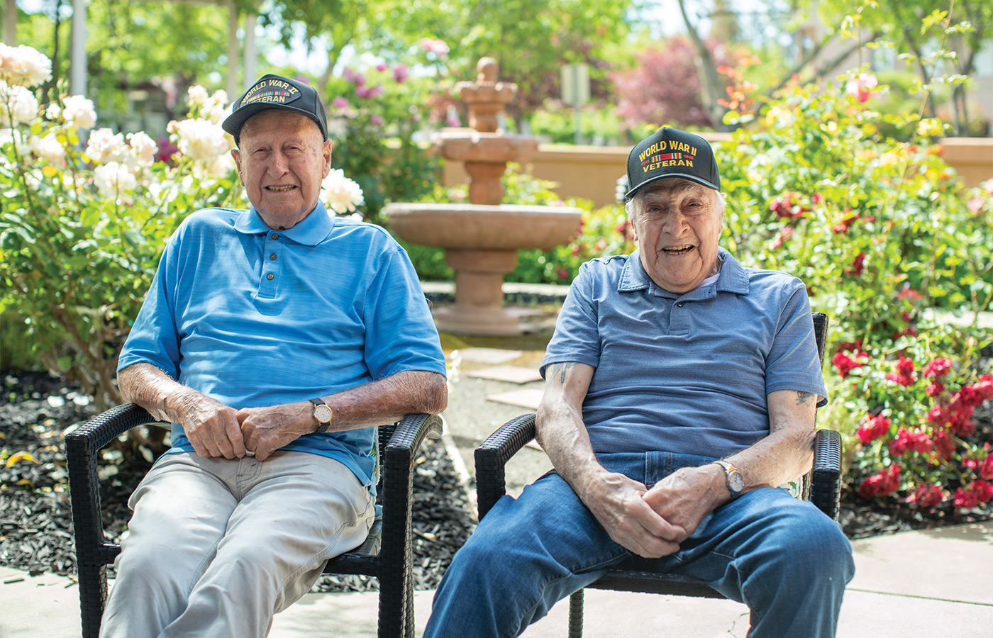 Two people sitting in the garden.