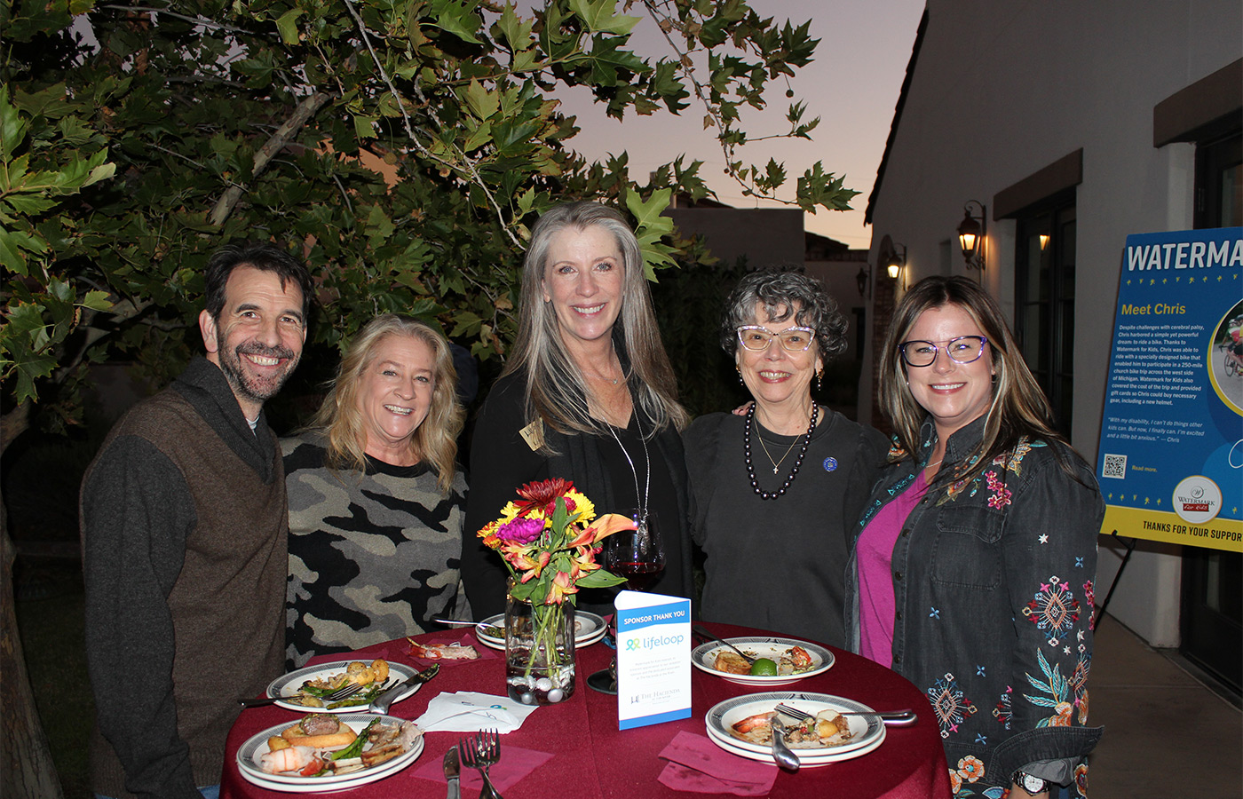 A group of people smiling.