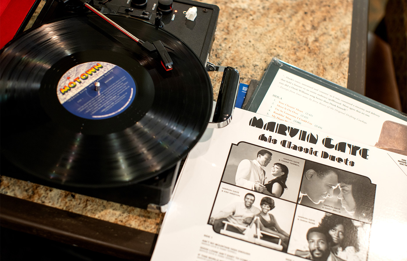 A record player with an album.