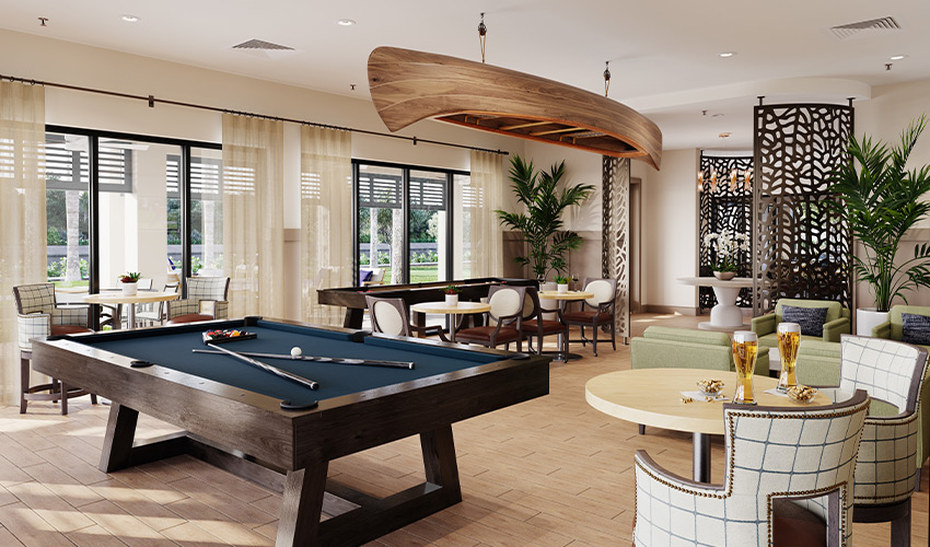 A lounge with a pool table.