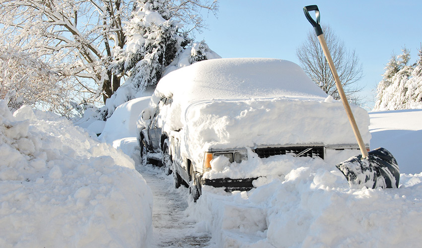 A car buried under snow.