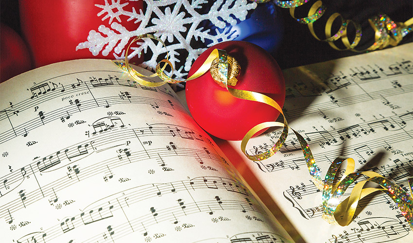 Sheet music and Christmas decorations.